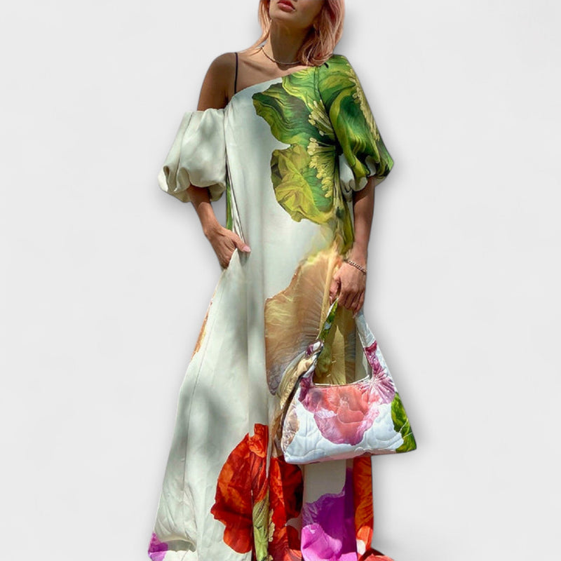 Skylar - Vestito maxi con stampa floreale, scollo asimmetrico e maniche a sbuffo