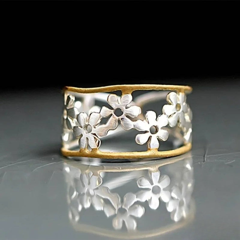 Anello di fiori irregolare con motivo cavo