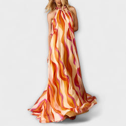 Rumi - Elegante vestito maxi intrecciato con motivo a onde
