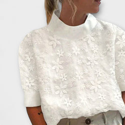 Blusa con collo alto semplice ricamato