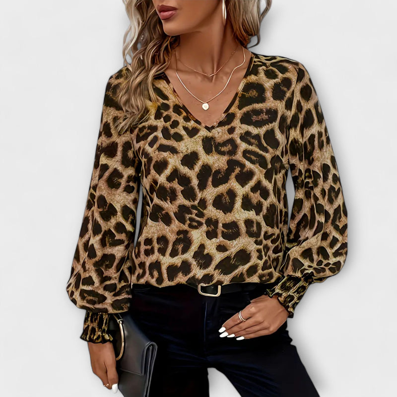 Blusa elegante con stampa leopardata