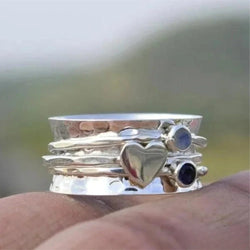 Anello rotante a forma di cuore