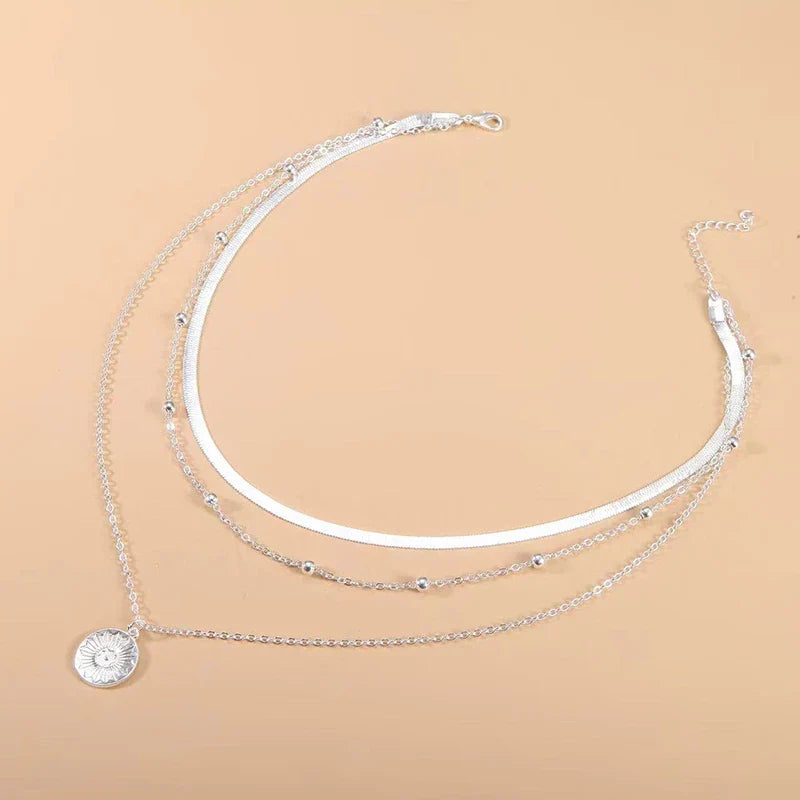 Collana Tripla