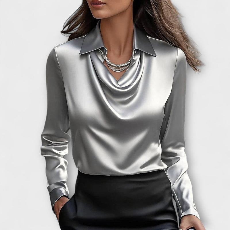 Blusa brillante con colletto arricciato