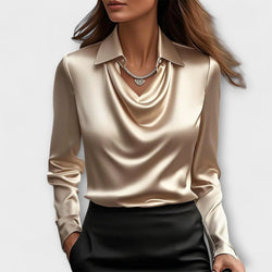Blusa brillante con colletto arricciato