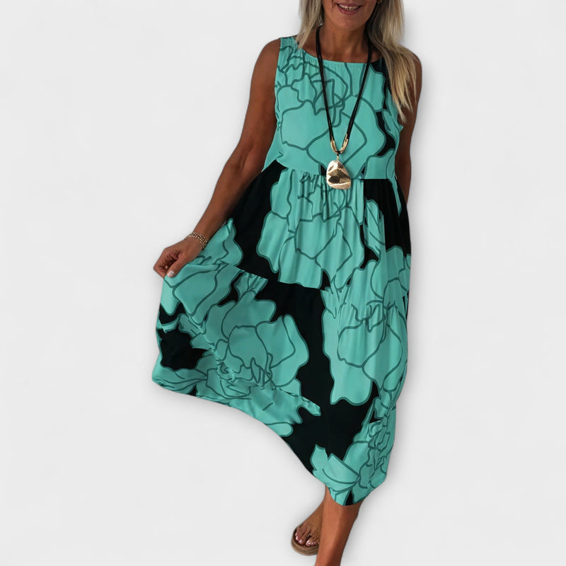 Vestito midi floreale con gonna a volant