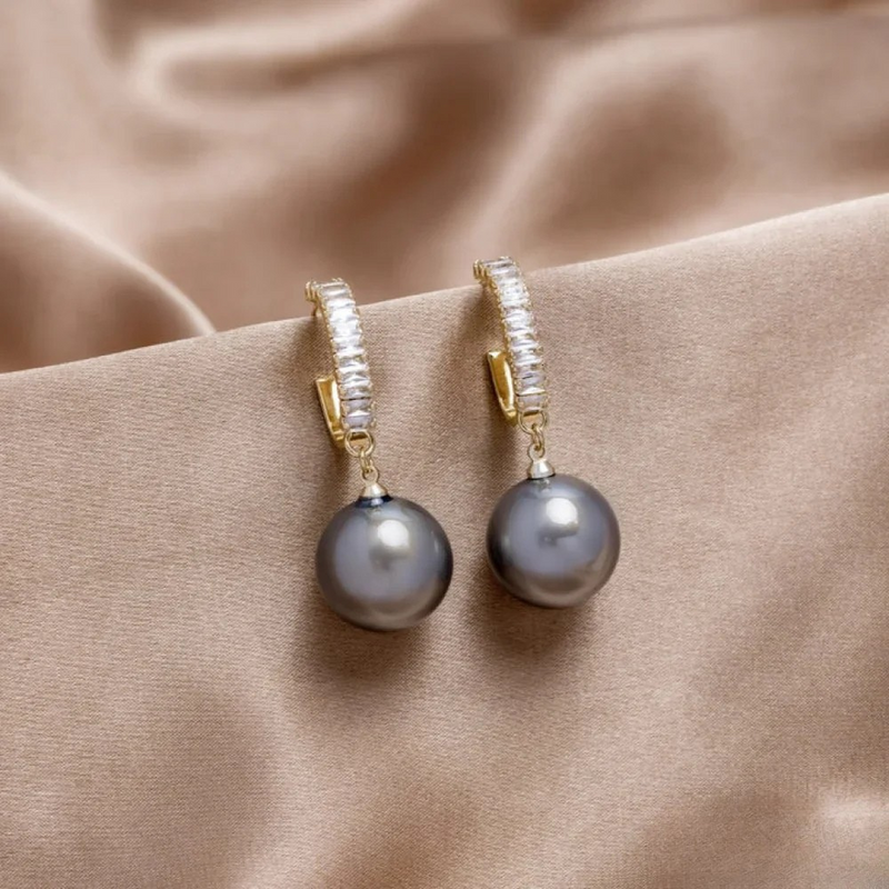 Orecchini eleganti con perle e zirconia