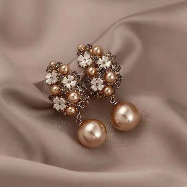 Orecchini eleganti con perle di fiori
