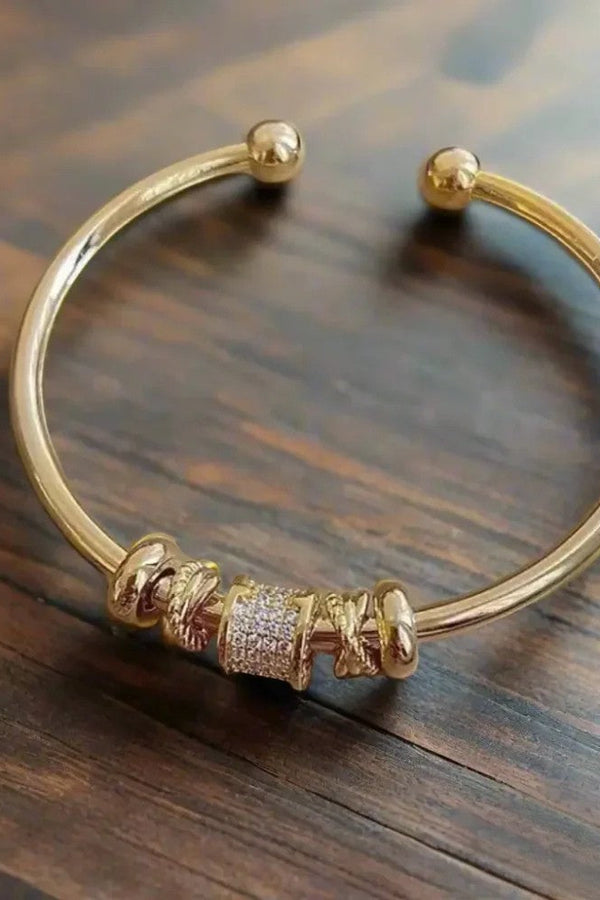 Bracciale regolabile con pendenti