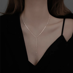 Collana a clavicola con frange