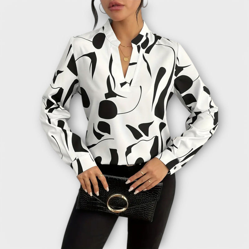 Blusa elegante a maniche lunghe con scollo a V
