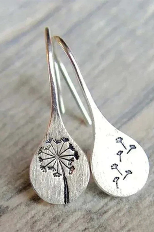 Eleganti orecchini con motivo a foglia di dente di leone